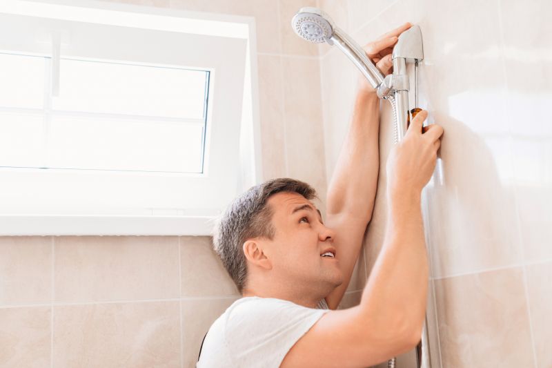 Worker Installing Shower